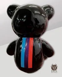 Resin statue of a BMW sitting bear for car enthusiasts